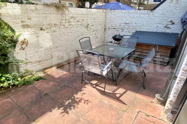 Spacious two bedroomed lower ground garden flat Alderney Street, Victoria / Pimlico